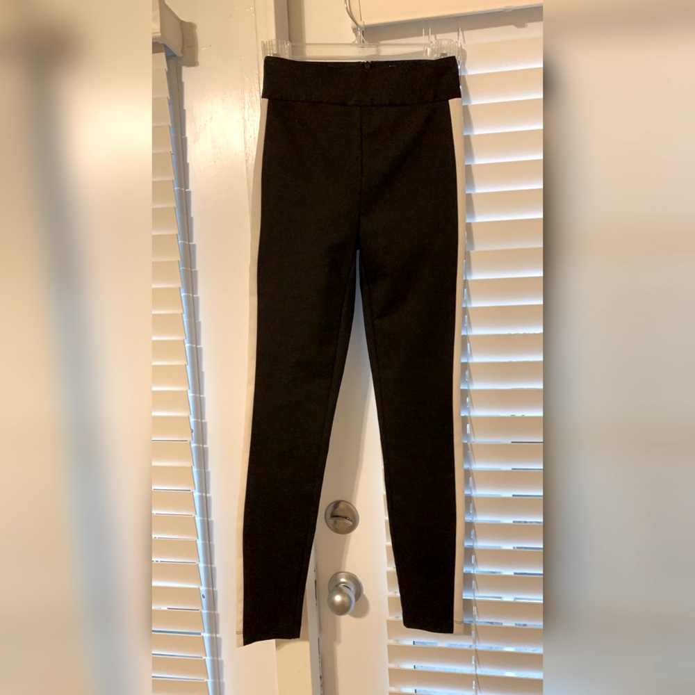 Black pants with white stripe